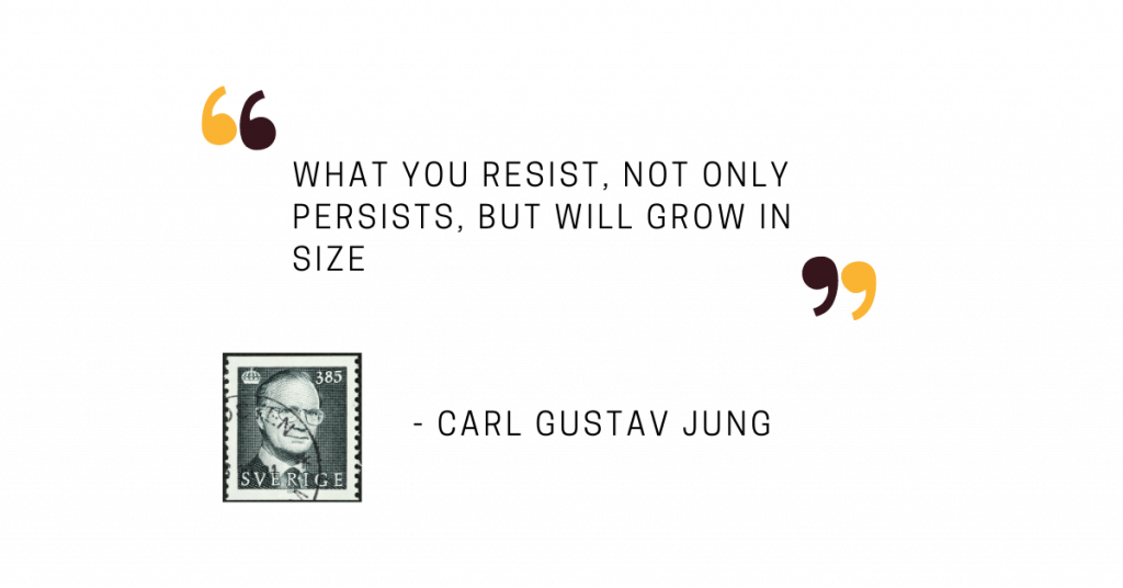 A quote from Carl Gustav Jung saying "What you resist not only persists, but will grow in size." You can also see a stamp which features a portrait of C.G. Jung.